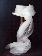 Ivory topper with cascading veil