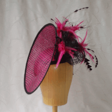Fuchsia and black saucer with feather trim
