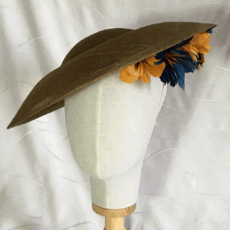 Khaki saucer with gold and navy feather flowers